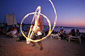 Fire dance in Cafe Momo near Cafe Del Mar, San Antoni, Ibiza, Spain