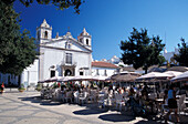 Cafe in front of a church, Lagos, Algarve, Portugal, Europe
