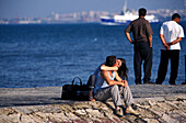 Kissing on the pier, Cais do Sodré, Lisbon Portugal