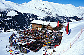 People at the Fuxaegufer Huette, Jakobshorn, Apres Ski, Grisons, Switzerland