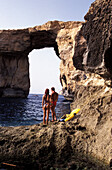 People in front of rock formation Azur Window, Gozo Island, Malta, Europe