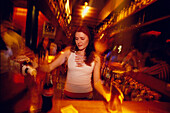 Waitress mixing cocktails in the bar, Otto Zutz Club, Nightclub in Gracia, Barcelona, Catalonia, Spain