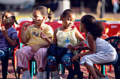 Children, Audience, Children are waiting for a show, Plaza Colon, Santo Domingo, Dominican Republic