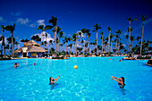 People swimming in a pool at Gran Paradise Resort in Bavaro, Dominican Republic, Antilles, Caribbean