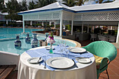 Table, Plates, Pool, Roofed, Covered, Table with plates near the pool of Hotel La Cocoteraie, Le Meridien, Saint-Francois, Grande Terre, Guadeloupe, Caribbean Sea, America