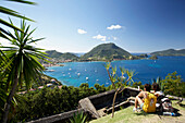 Panoramic view, Couple admiring the view, Fort Napoleon, Terre-de-Haute, Les Saintes Islands, Guadeloupe, Caribbean Sea, America