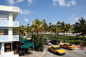 Taxis crossing on Ocean Drive, South Beach, Miami Florida, USA
