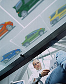 Portrait of car designer M. Merz in his office, Germany