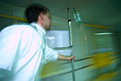 Doctor in a hospital pushing a drip, Health, Hospital