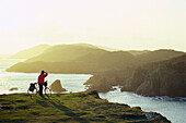 Cyclist enjoying the view, Beacon Point, Baltimore, Cork, Ireland