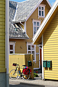 Bike resting against a fence, Cycle tour of Egersund, Rogaland, Norway