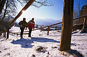 Walking Tour in Winter, Two people walking through winter landscape, Garmisch-Partenkirchen, Bavaria, Germany