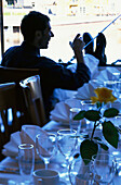 An angler fishing for food in a restaurant, Radisson, SAS Hotel, Trondheim, South Trondelag, Norway