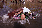 A pilgrim's Baptism in the river Rio Quema, Andalusia, Spain