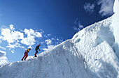 Two people ice climbing, Briksdal glacier, Norway, Fully released