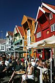 People sitting in a street cafe, Skagen, Stavanger, Rogaland, Norway