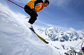 Skier skiing downhill in Sulden, South Tyrol, Italy