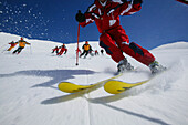 Group of skiers on the slope, Skiing downhill, Sulden, Italy