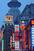 Buildings with neon signs in the evening, Shanghai, China, Asia