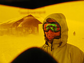 View through ski goggles at Mottolino ski hut, Livigno, Italy