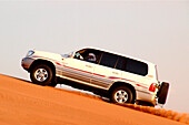 Jeep on a dune in the desert, Dubai, UAE, United Arab Emirates, Middle East, Asia