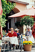 Radfahrer, Straßencafe, Morcote, Luganer See Schweiz