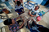 Dominospieler, Cai, Bonaire Niederlaendische Antillen