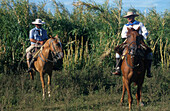 Gauchos zu Pferd, Esteros del Iberá Corrientes, Argentinien