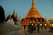 Shwedagon Pagoda, Burma, Myanmar, Tourists taking photos, Shwedagon Pagoda, evening light