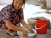 Woman is washing rice, Silk Road Uzbekistan