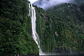 Waterfall at Milford Sound fiord, Fiordland National Park, South Island, New Zealand, Oceania