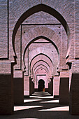 Arcade of a mosque in the sunlight, Morocco, Africa