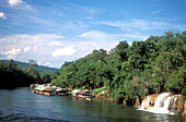 View at floating huts and waterfall on Kwae Noi river, Sai Yok National Park, Kanchanaburi, Thailand, Asia
