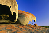 Man looking at Rock formations, Granite Boulders, Kangaroo Island, South Australia
