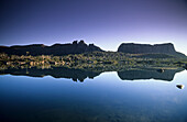 Early morning mirrored reflection of Mount Geryon in Lake Elysia, Overland Track, Cradle Mountain-Lake St Clair National Park, Tasmania, Australia