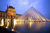 Glass pyramid and Louvre in the evening, Paris, France, Europe