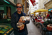 Young Man & Bulldog, in Bozen South Tyrol, Italy