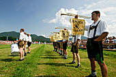 Trombone player, first oxrace of Bichl, Posaunenblaeser, Erstes Bichler Ochsenrennen am 8.8.2004 in Bichl, Oberbayern, Deutschland August 8th 2004, Upper Bavaria, Germany