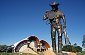 Statue of a stockman outside the Australian Stockman's Hall of Fame museum, museum dedicated to the history of the outback settlers such as explorers, sheep shearers stockmen, Longreach, Queensland, Australia
