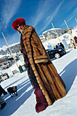Jet Set, woman wearing a fur coat, St. Moritz, Grisons, Switzerland, Europe
