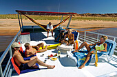 People on houseboat, Lake Powell, Arizona-Utah, USA