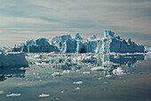 Icebergs under a cloudy sky, Ilulissat, Greenland