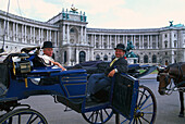 Two men in a fiaker in front of new Hofburg, Vienna, Austria, Europe