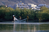 Fishermen in the mangroves near Muscat, Oman