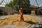 Chaff or husks used as fuel, for outdoor kiln, Myanmar