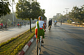 Bicycle tour, tourists, Burma, Fahrradtour, Touristen in Burma, Reisegruppe, Bago Hauptstrasse, Cycling tour, travel group, mainstreet Bago