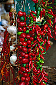 Bundels of red and green pepperoni, Apulia, Italy