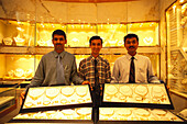 Three men showing golden jewelry, Dubai City, United Arab Emirates, Middle East, Asia