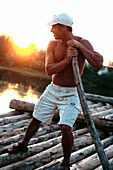 Man on a float, Isar River, Upper Bavaria, Germany