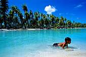 Boy, Lagoon, Takapotu, Tuamotu Islands French Polynesia, South Pacific